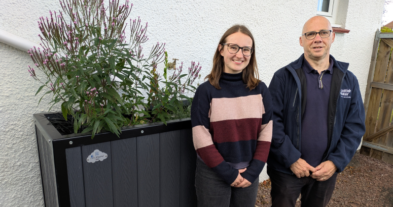 Isla Kendall and Ed Ptolomey with one of the new storm water planters