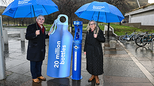 Cabinet Secretary Gillian Martin and Scottish Water COO Peter Farrer at Holyrood top up tap to celebrate saving 20m plastic bottles in the environment