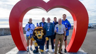 Raith Rovers and Fife Flyers players as well as Local Councilors under the Kirkcaldy Love Heart Sculpture with their Scottish Water Bottles in hand